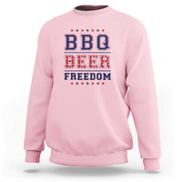 Light pink crewneck sweatshirt with "BBQ BEER FREEDOM" patriotic graphic