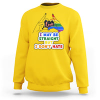 Daisy yellow unisex sweatshirt with pride flag “Love” and slogan “I may be straight but I don’t hate”.