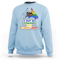 Light blue unisex sweatshirt with pride flag “Love” and slogan “I may be straight but I don’t hate”.