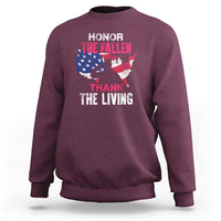 Maroon crewneck sweatshirt with American flag and “Honor the Fallen, Thank the Living” print
