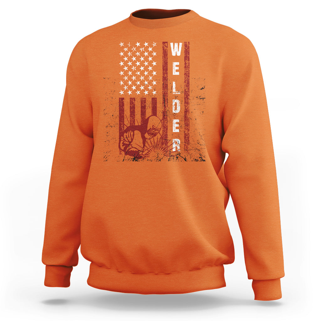 Orange crewneck sweatshirt with American flag welder graphic and vertical WELDER print