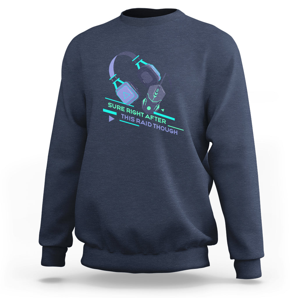 Navy crewneck sweatshirt with teal gaming controller raid graphic on front