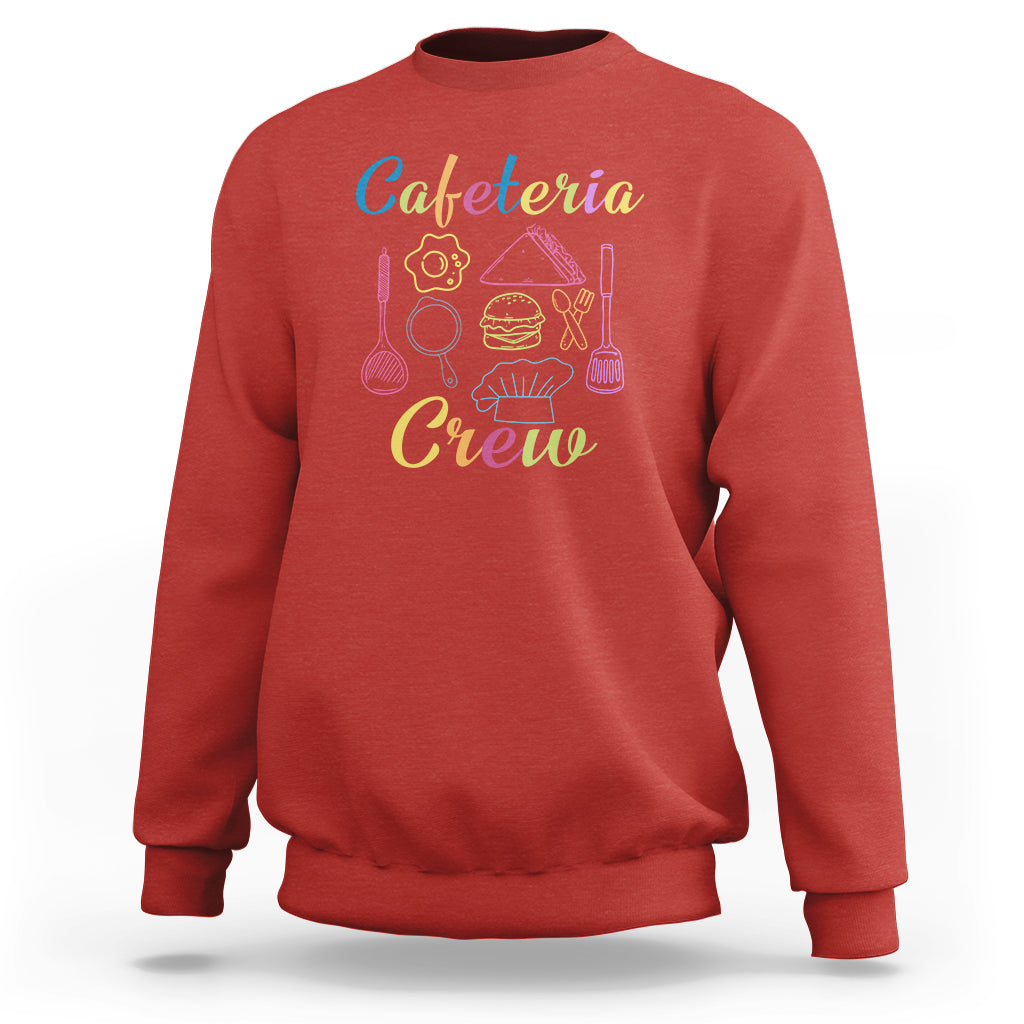 Red crewneck sweatshirt with “Cafeteria Crewe” graphic on the front.