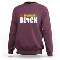 Maroon sweatshirt with front graphic text "MY SOULMATE IS BLACK"