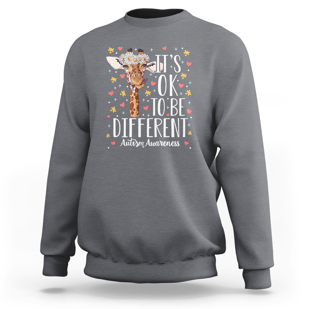 Heather gray autism awareness sweatshirt with giraffe floral graphic: 'It's OK to be different'