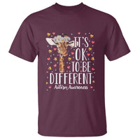 Maroon T-shirt with giraffe floral 'It's OK to be different' graphic