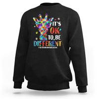 Black crewneck sweatshirt with colorful giraffe autism awareness graphic on back.