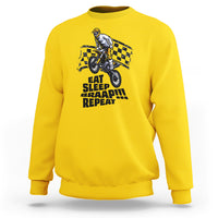 Daisy yellow dirtbike sweatshirt with front rider graphic and “EAT SLEEP BRAAP REPEAT” text.