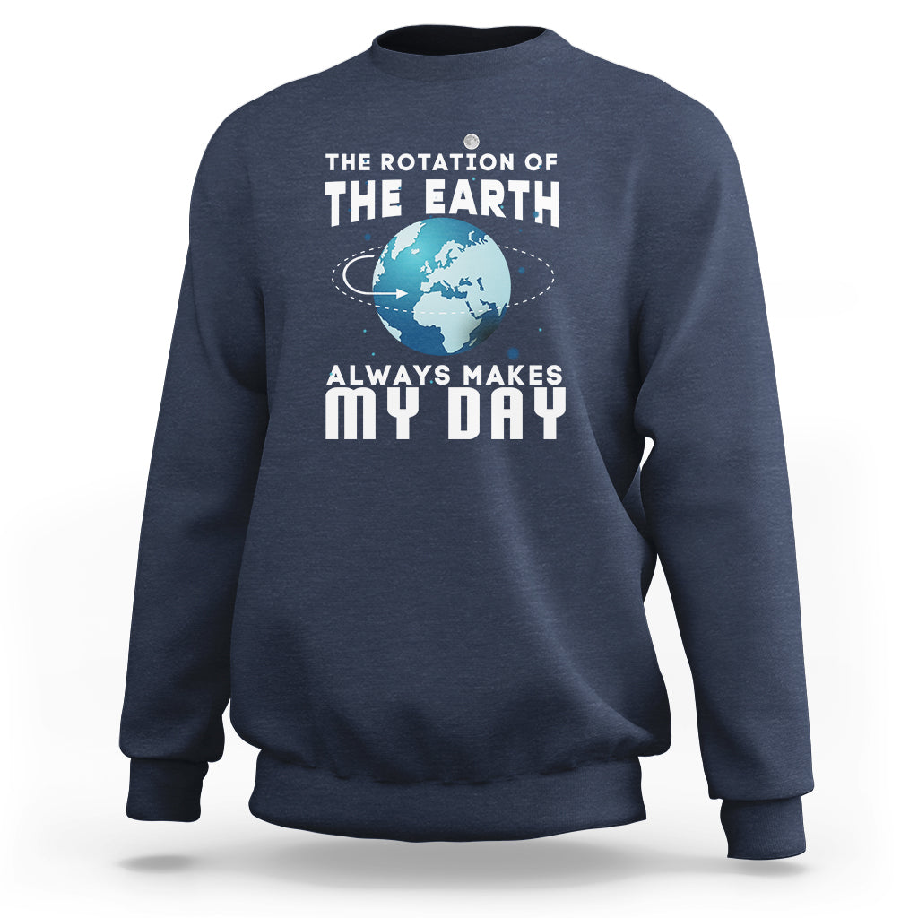 Navy sweatshirt with “THE EARTH” globe graphic and “ALWAYS MAKES MY DAY” lettering