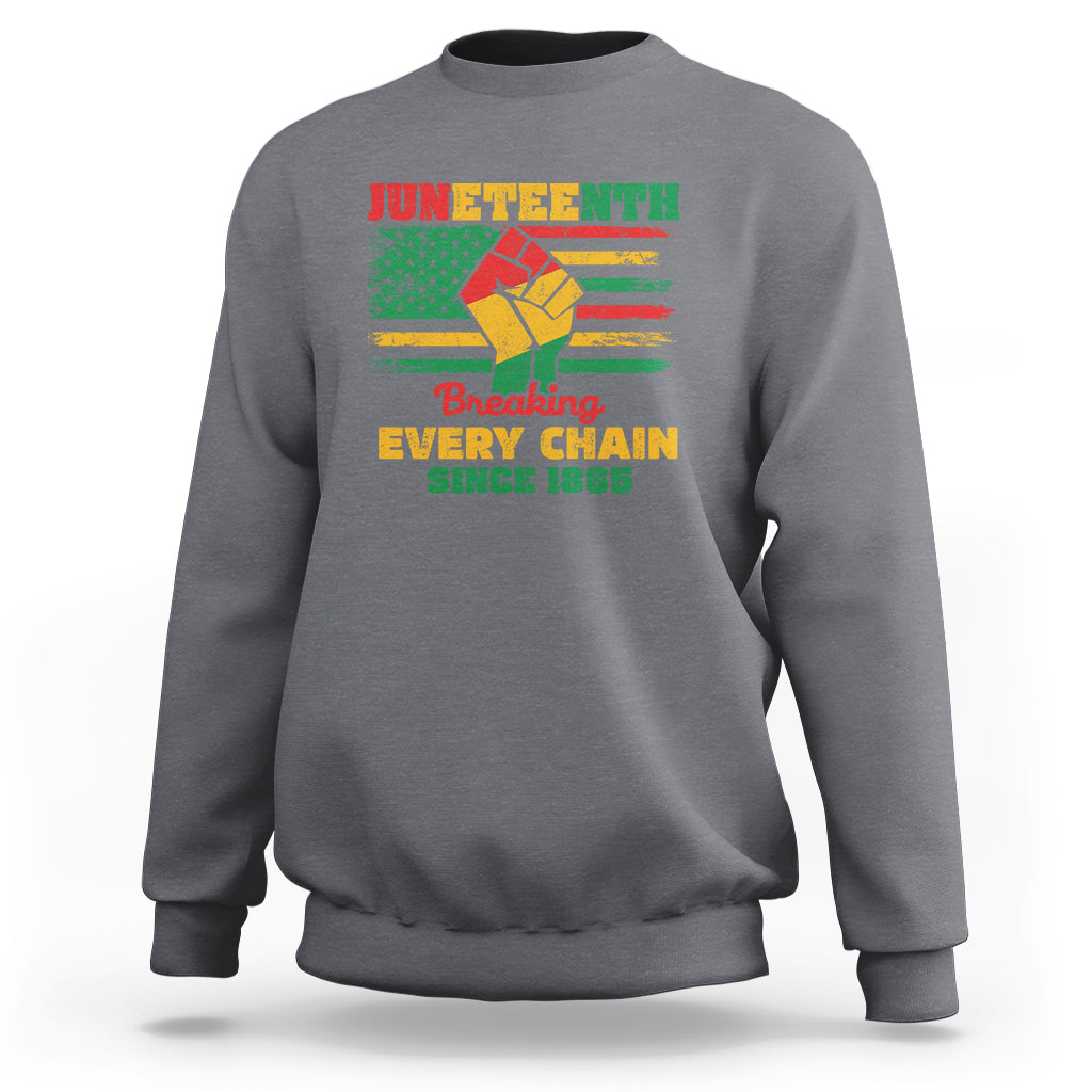 Dark heather gray crewneck sweatshirt with front Juneteenth graphic reading “Breaking Every Chain”