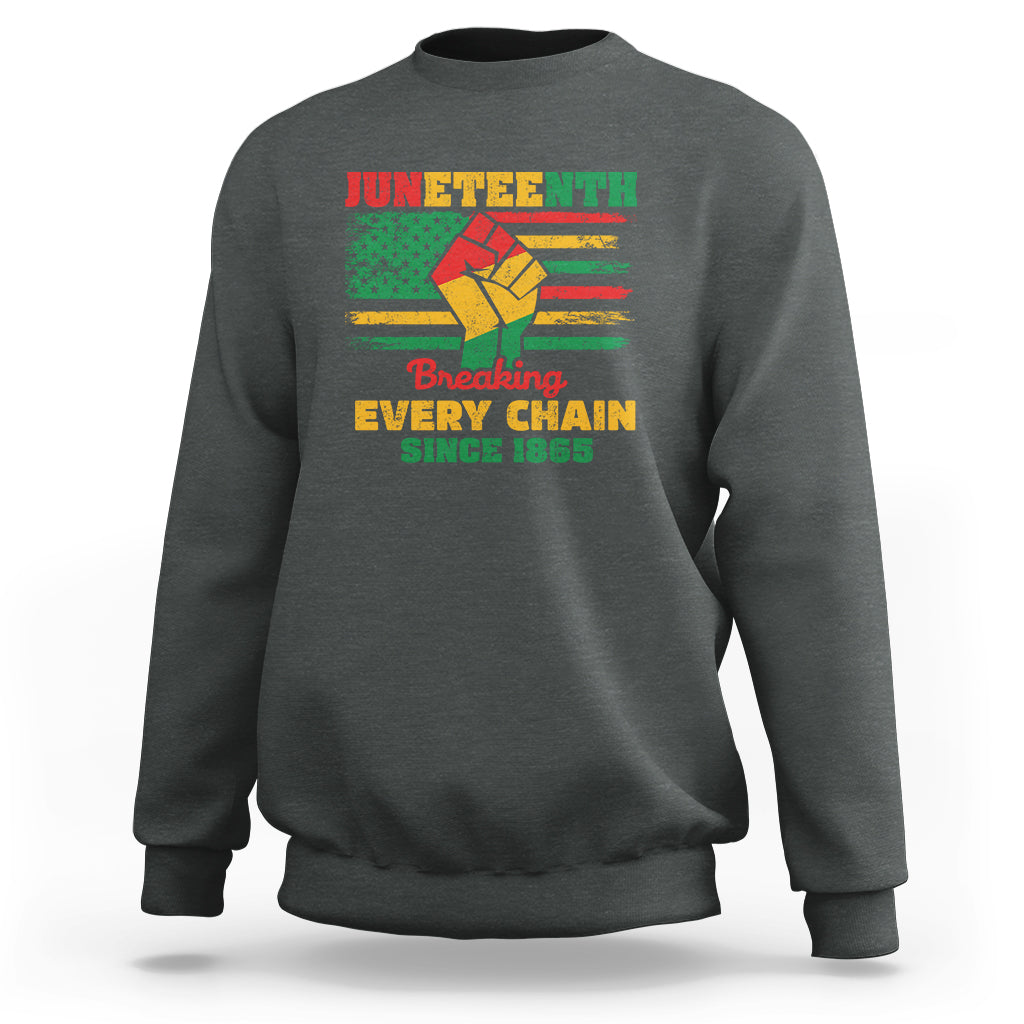 Charcoal gray crewneck sweatshirt with front Juneteenth graphic reading “Breaking Every Chain”