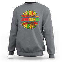 Charcoal crewneck sweatshirt with colorful Juneteenth sunflower graphic