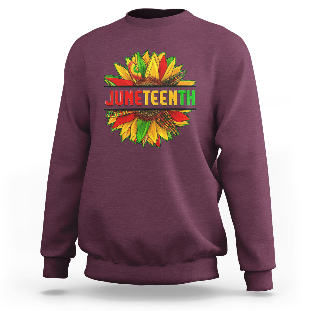 Maroon crewneck sweatshirt with colorful Juneteenth sunflower graphic