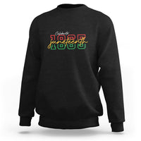 Black crewneck sweatshirt with colorful Celebrate Juneteenth 1865 front graphic