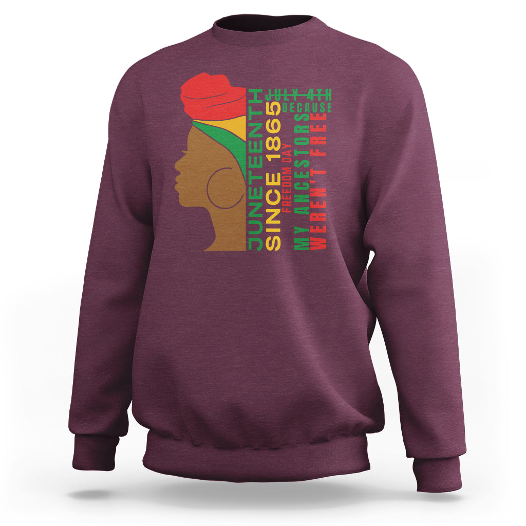 Maroon crewneck sweatshirt with Juneteenth-themed face and text graphic on front