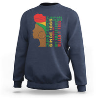 Navy crewneck sweatshirt with Juneteenth-themed face and text graphic on front