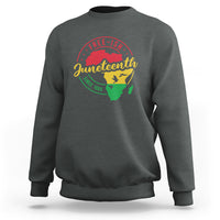 Dark heather gray crewneck sweatshirt with circular Juneteenth-themed graphic print on back