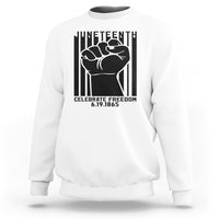White crewneck sweatshirt with black Juneteenth-style fist graphic on the front