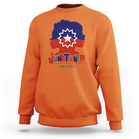 Women’s Juneteenth sweatshirt in orange, crewneck with multicolor front graphic