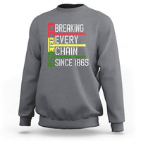 Dark heather crewneck sweatshirt with multicolor “Breaking Every Chain Since 1865” graphic