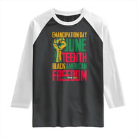 Long-sleeve raglan shirt, dark gray body with white sleeves; Juneteenth graphic print