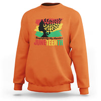 Orange Juneteenth sweatshirt with multicolor ancestor silhouette and 'Juneteenth' text