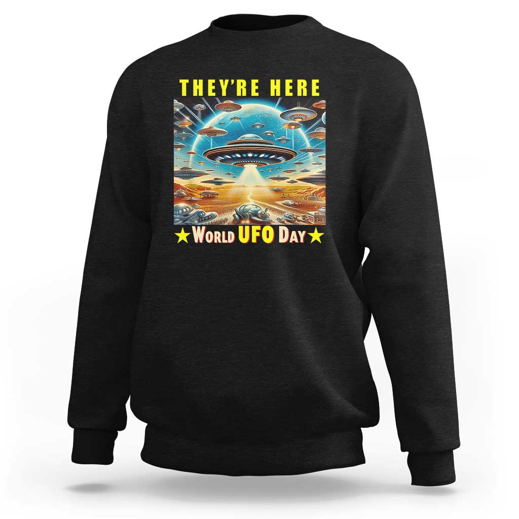 Black sweatshirt with centered UFO graphic and “World UFO Day” text on back