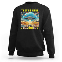 Black sweatshirt with centered UFO graphic and “World UFO Day” text on back