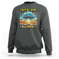 Dark heather sweatshirt with centered UFO graphic and “World UFO Day” text on back