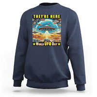Navy sweatshirt with centered UFO graphic and “World UFO Day” text on back