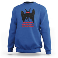 Royal blue sweatshirt with black mothman graphic and red text "MOTHMAN IS REAL"