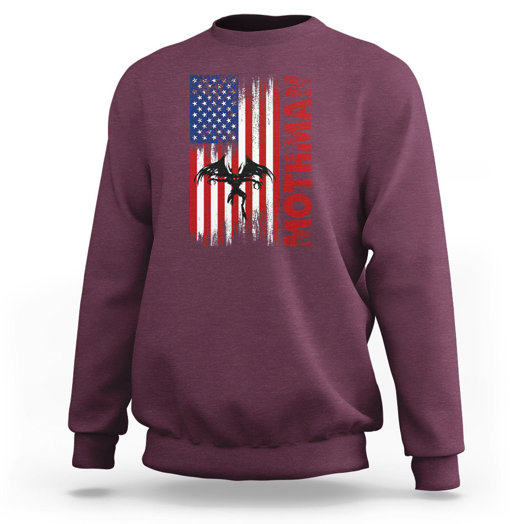 Maroon crewneck sweatshirt with American flag-style graphic and vertical red text on chest