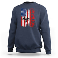 Navy crewneck sweatshirt with American flag-style graphic and vertical red text on chest