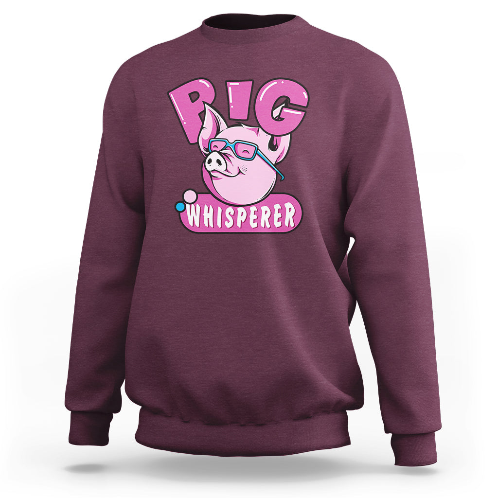 Pig whisperer sweatshirt, maroon with pink pig 'PIG WHISPERER' graphic