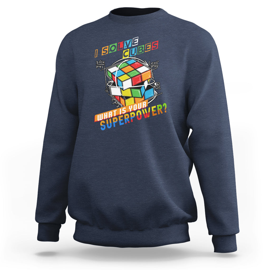 Navy crewneck sweatshirt with colorful cube graphic and 'What is your superpower?' text