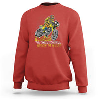 Red motorcycle sweatshirt with yellow and white rider graphic and 'WIND IS FREE' print