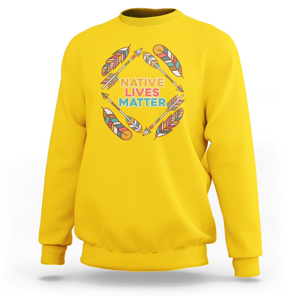 Daisy yellow crewneck sweatshirt with Native Lives Matter feather wreath graphic
