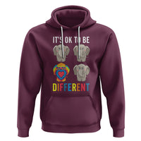 Burgundy hoodie with elephant graphic and “It’s ok to be different” print
