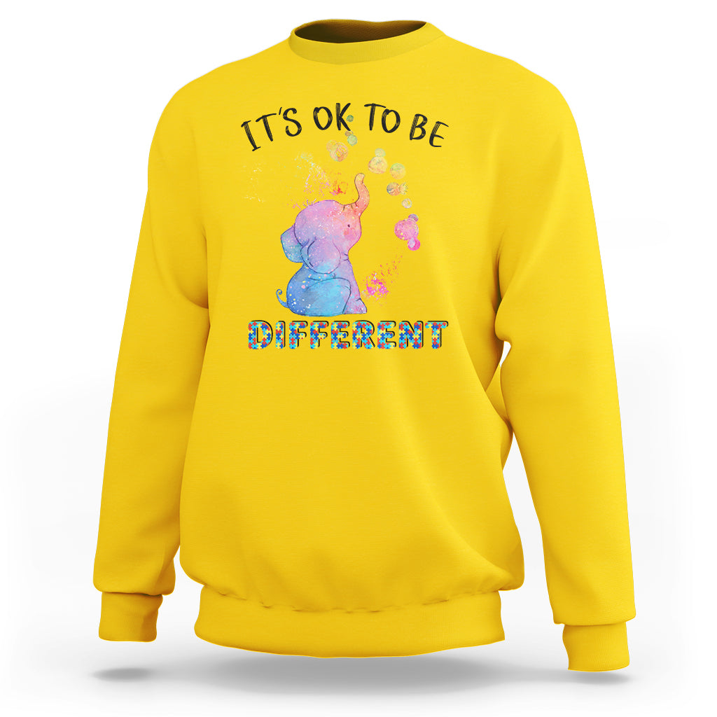 Autism support sweatshirt, yellow with watercolor elephant and “It’s ok to be different” text