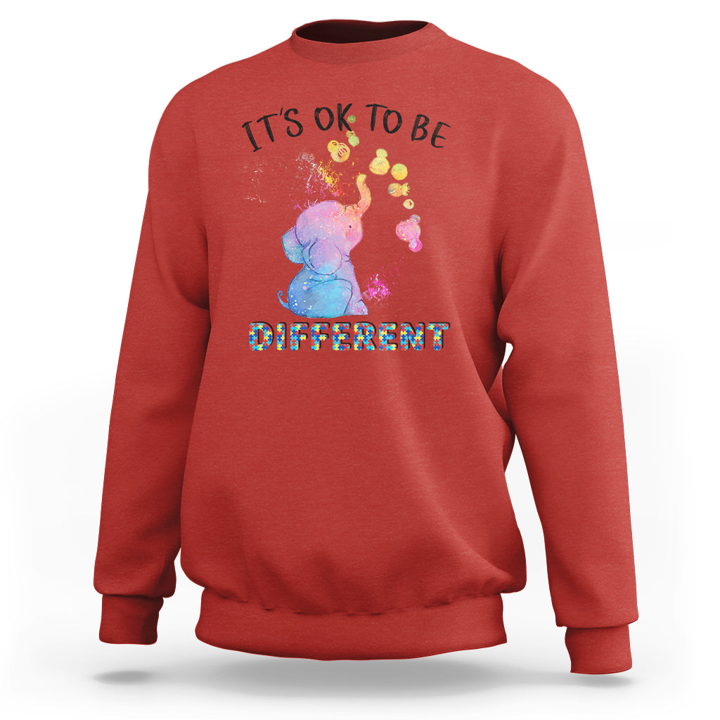 Autism support sweatshirt, red with watercolor elephant and “It’s ok to be different” text