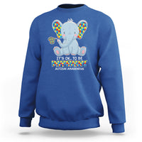 Royal blue sweatshirt with colorful autism awareness elephant graphic