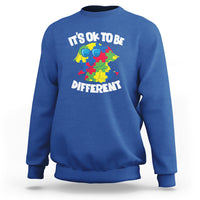 Royal blue autism awareness sweatshirt with “It’s OK to be Different” elephant graphic.