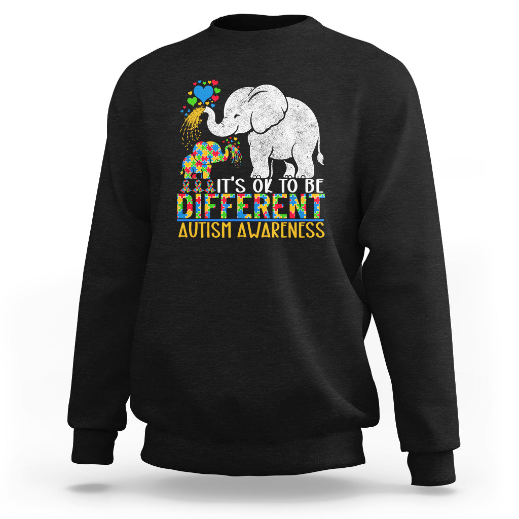 Black crewneck sweatshirt with colorful elephant autism awareness graphic and slogan