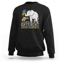 Black crewneck sweatshirt with colorful elephant autism awareness graphic and slogan