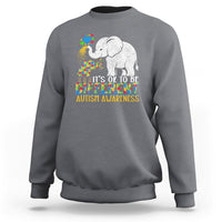 Charcoal crewneck sweatshirt with colorful elephant autism awareness graphic and slogan