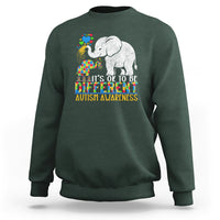 Dark forest green crewneck sweatshirt with colorful elephant autism awareness graphic and slogan