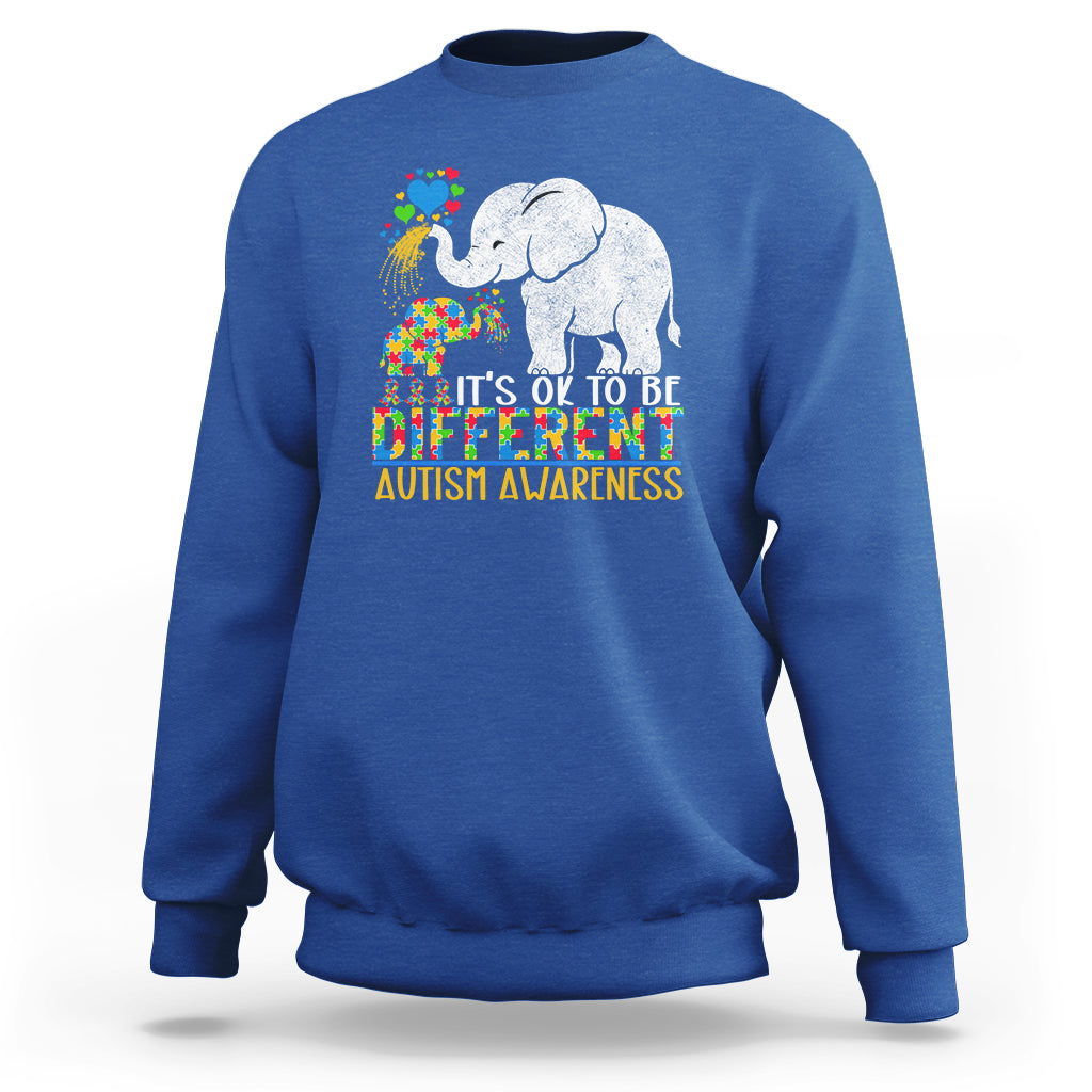 Royal blue crewneck sweatshirt with colorful elephant autism awareness graphic and slogan