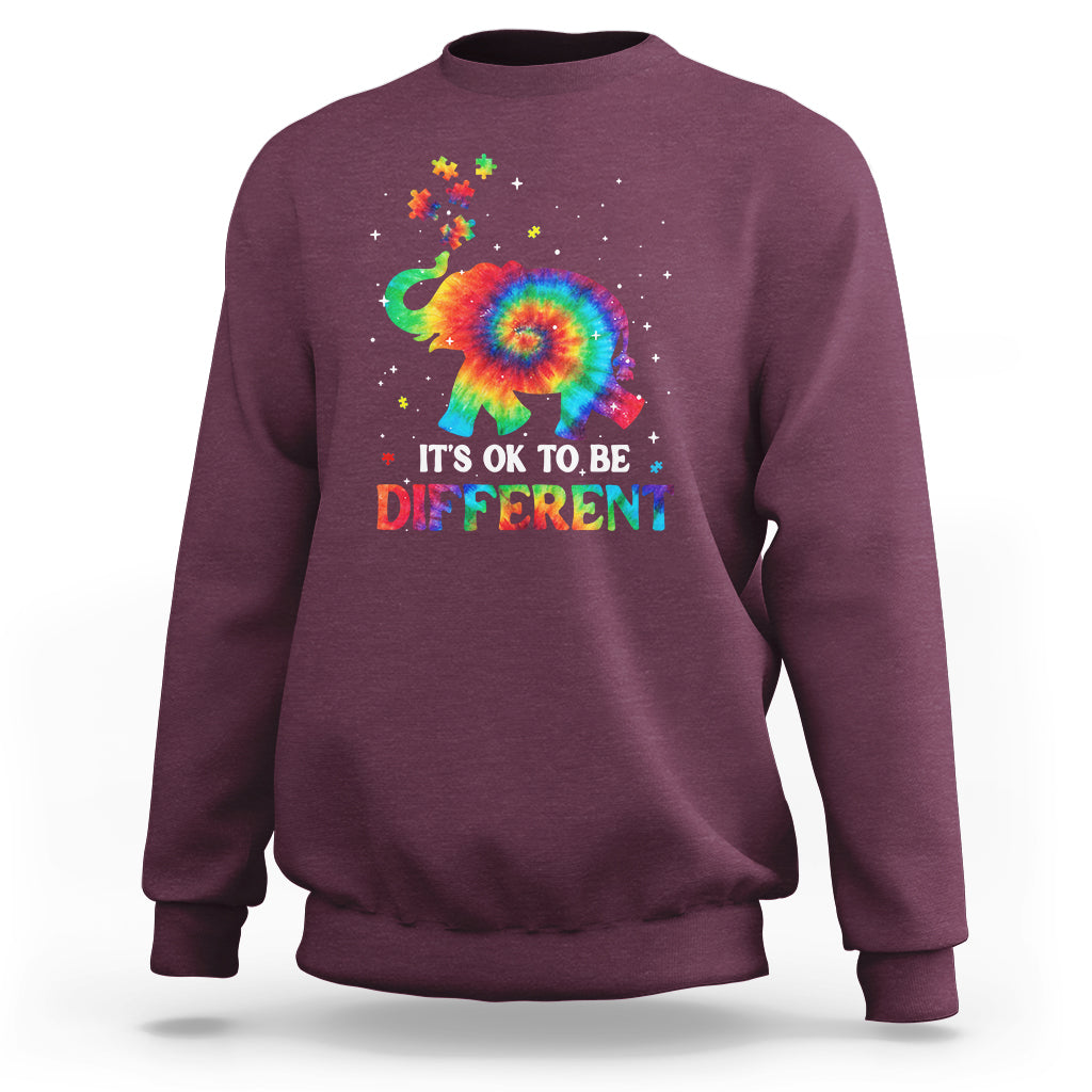 Tie-dye elephant autism sweatshirt in maroon, “It’s Ok To Be Different” graphic