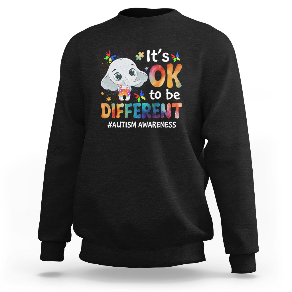 Black sweatshirt with cartoon elephant graphic and “It’s OK to be DIFFERENT” text