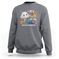 Gray sweatshirt with cartoon elephant graphic and “It’s OK to be DIFFERENT” text